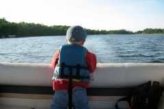 boy-riding-in-boat-cs